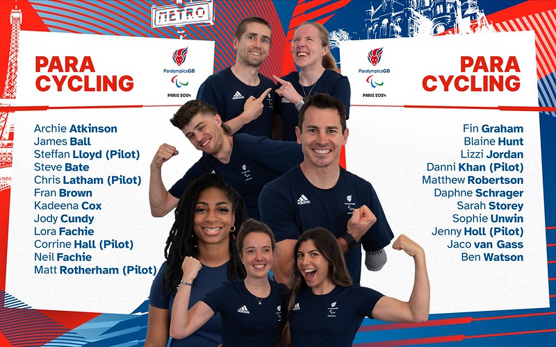 The image is a promotional graphic for the ParalympicsGB Para Cycling team for Paris 2024. It features several athletes arranged in a collage style, each wearing navy blue team shirts with the Paralympic logo. They are making enthusiastic gestures, such as flexing their arms and smiling, displaying a sense of team spirit and positivity. On the left and right sides of the image, there are lists of the athletes' names divided into two columns under the title "PARA CYCLING." Notable design elements include a red, white, and blue color scheme with stylized illustrations of landmarks in the background, emphasizing the event's connection to Paris. The ParalympicsGB and Paris 2024 logos are prominently displayed, reinforcing the team's association with the Paralympic Games. The athletes appear diverse, and the image captures a celebratory and motivational atmosphere.