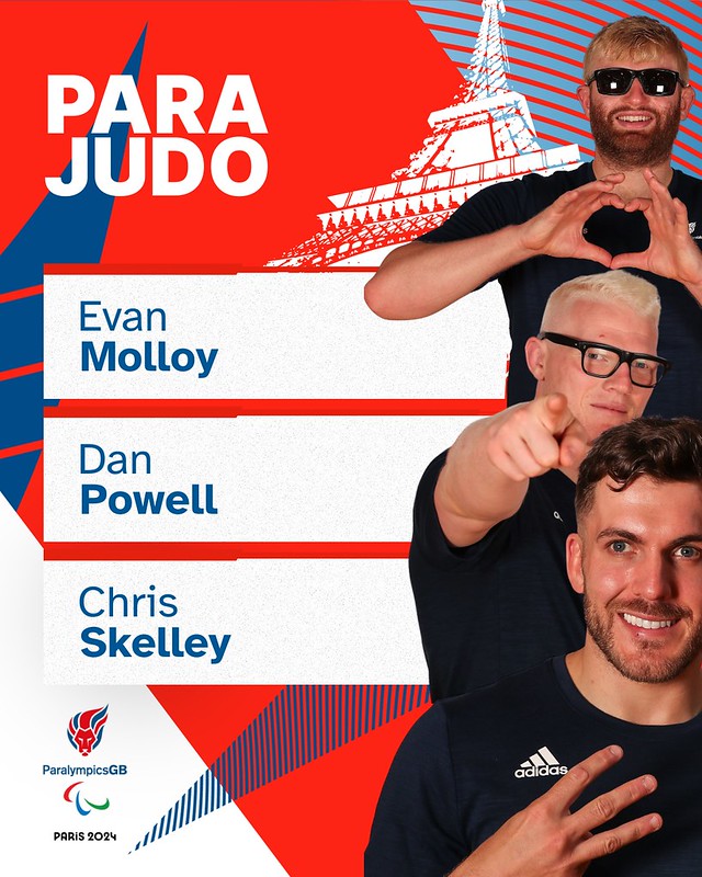 The image is a promotional poster for the ParalympicsGB Para Judo team, featuring three athletes. The background is a dynamic design in red, white, and blue, with the text "PARA JUDO" in bold white letters at the top left. Behind the athletes, there is an abstract depiction of the Eiffel Tower, signifying the Paris 2024 Paralympic Games. The athletes are presented as follows: 1. **Evan Molloy** (middle of the image): Evan is wearing black-framed glasses and is pointing towards the camera with a smile. He has short, light blonde hair. 2. **Dan Powell** (bottom right): Dan is smiling and making a hand gesture, possibly a heart shape, in front of his chest. He has short, light brown hair and a beard. 3. **Chris Skelley** (top right): Chris is making a heart shape with his hands, and he is wearing sunglasses. He has blonde hair and a beard. The names of the athletes are listed on the left side in blue text on white bars: - Evan Molloy - Dan Powell - Chris Skelley At the bottom left of the poster, the ParalympicsGB logo is displayed along with the Paralympic symbol and the text "PARIS 2024."